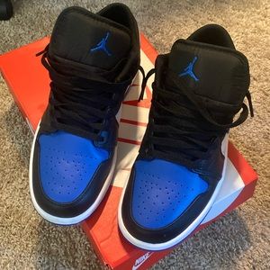 Low air Jordan 1s. Blue. Black and white combination